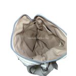 Fehér női hátizsák, kézitáska, és oldaltáska egyben. 